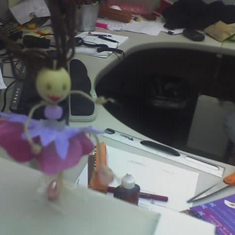 Engineer in the retreading phase of her career, that is to say... she wears purple, but isn't ready for the red hat yet.