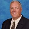 Teacher, Gilman School; Attorney, part-time; Volunteer Coach, Towson University Softball; married, father of two
