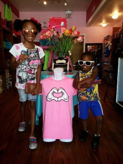 We are a woman and mens apparel boutique, specializing in jewelry, shoes, and also accessories. Check out our Free Love shirts on http://t.co/dWrkLJmJs4