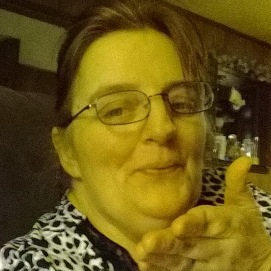 53 yrs old Wife and Mother and Grandmother who loves her family and enjoys sports and playing games