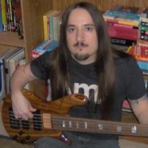 bassist/chapman stickist/vocalist, atheist, disabled, a decent cook, humorous, muso, open, reader & writer, sarcastic, scarred... I can do this all day. ;-)
