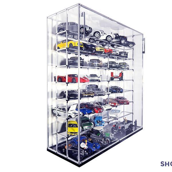 We make high-end, dust free, display cabinets for 1/18 and 1/43 diecast models. Made from aluminium, crystal clear acrylic, carbon fiber, real fine leather.