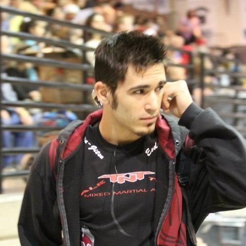 MMA fighter, certified personal trainer, martial arts instructor at TNT Mixed Martial Arts Training Center.