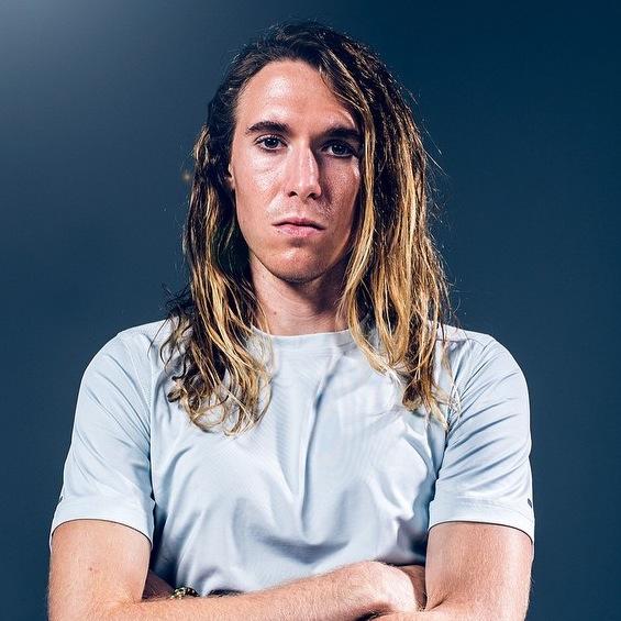 Long-haired runner for Zap Fitness.