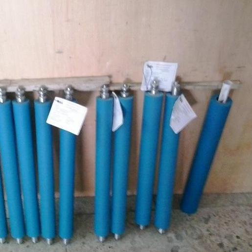 empresa dedicada al reencauche y fabricacion  de rodillos industriales