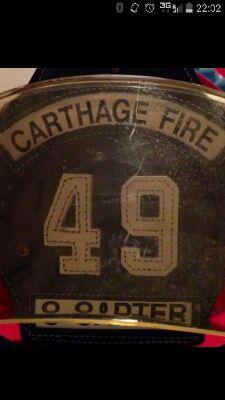 Firefighter with Carthage Fire Dept. and Central Dist. Fire Dept. and South Carthage Fire Dept. work street maintenance for the town of Carthage