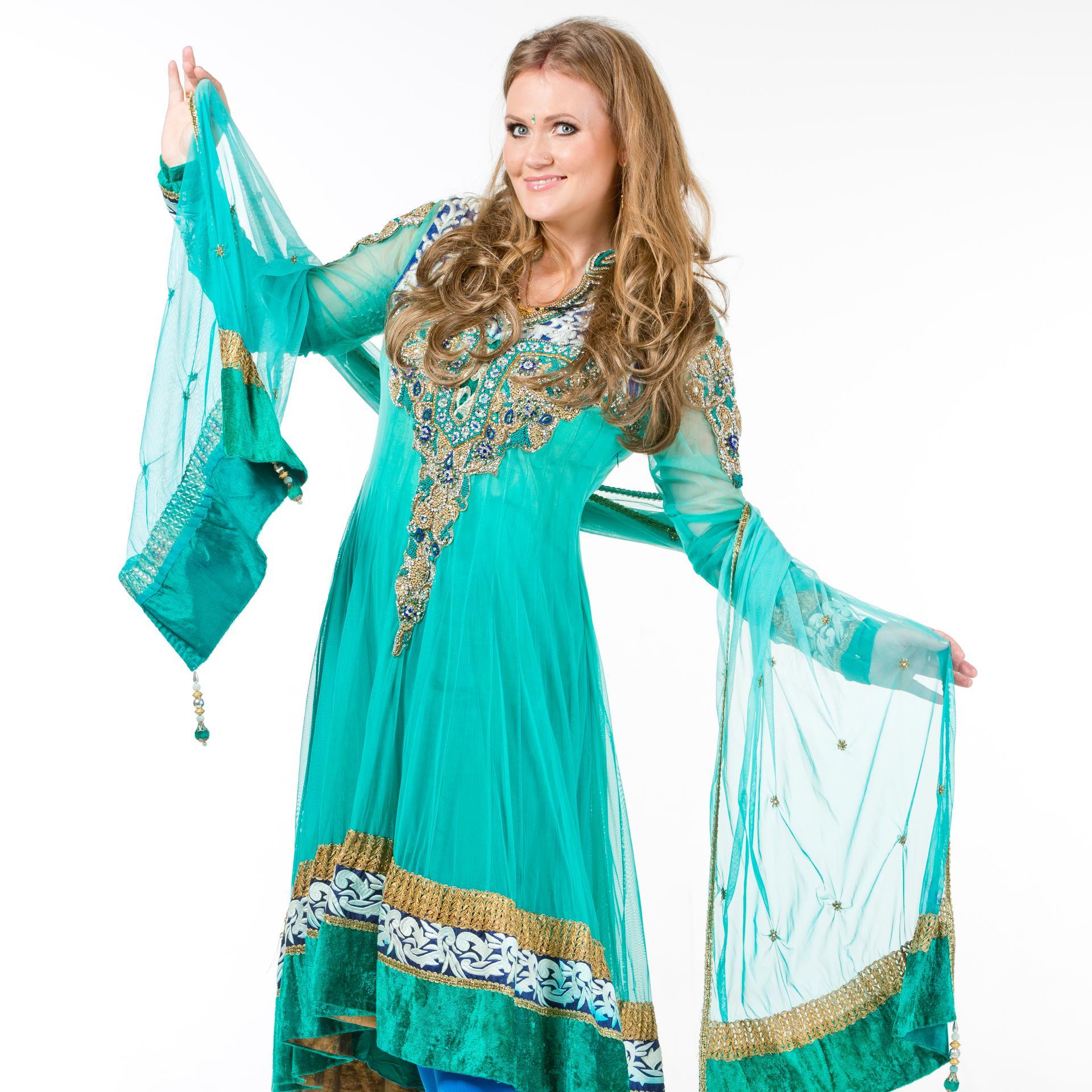 Airi Vipulkumar Kansar (Airi Ojamets) - The Country-Singing Queen of Estonia, as titled in Estonian media.