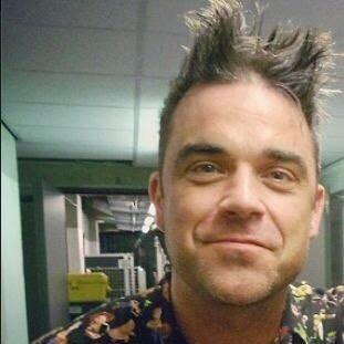 Here you will find the clothing worn by Robbie Williams. I will try my best :) Enjoy!