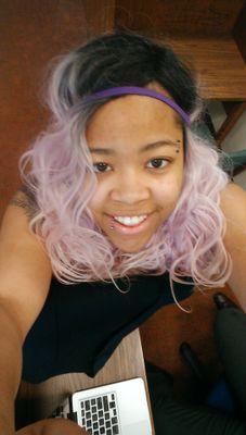 I got feathers in my hair I get down to beat poetry #UNCC17