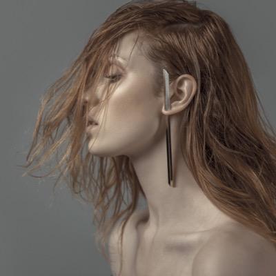 Ξ Γ ▽ Ф is made by the designer Elizabeth Rustrian in the search of new aesthetic of fashion.