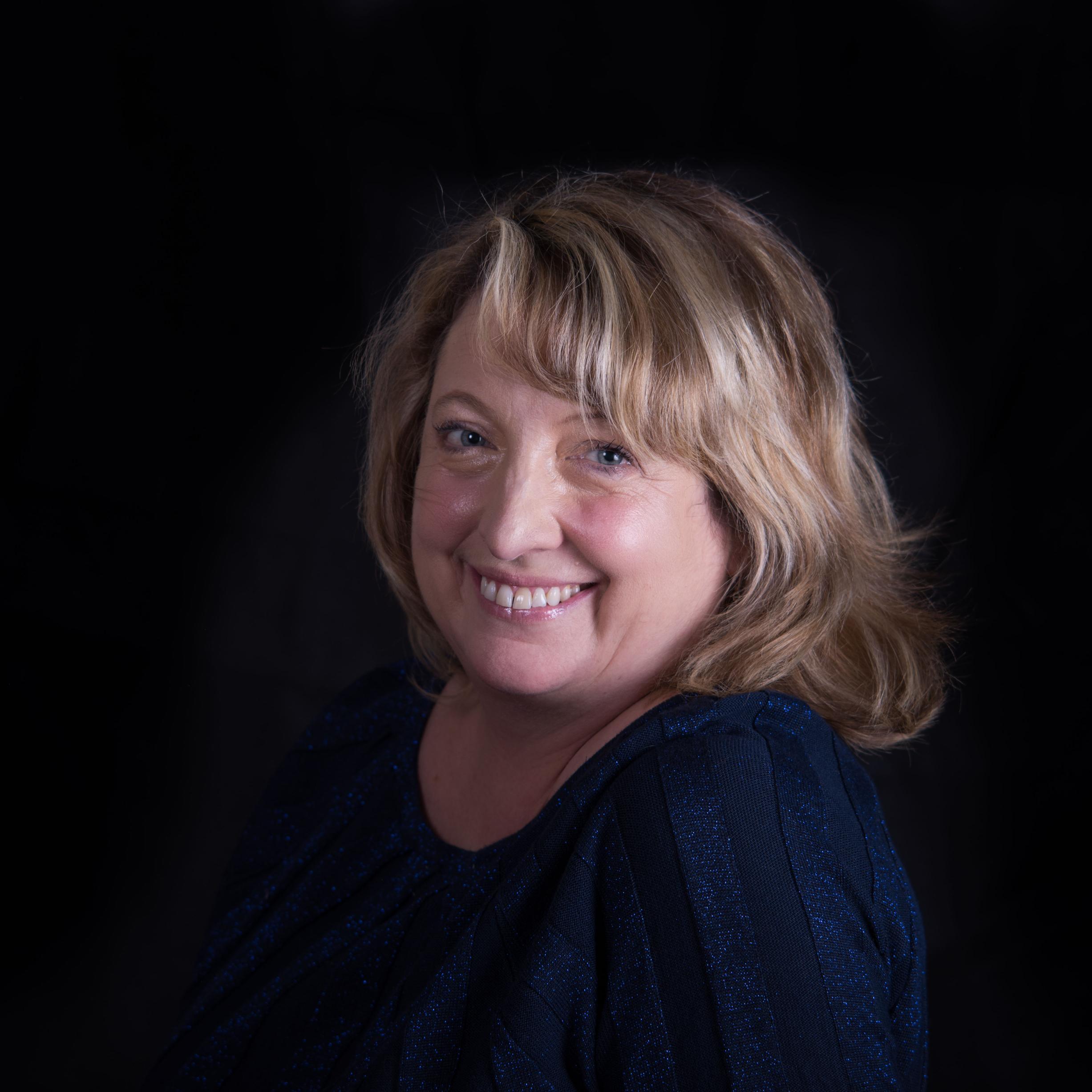 Dual nationality (USA/UK), professional novelist and ghost writer, also professional cellist (Indiana University).  Married, mother of one child.
