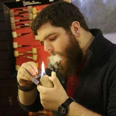 Just a man with a beard and a passion for fine tobacco.