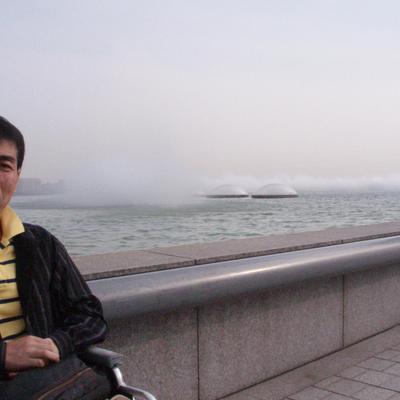 高野賢