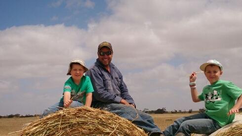 farmer  and salesman @ emmetts john deere