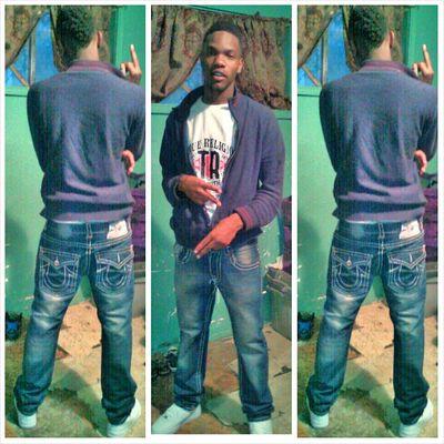 Young Rich Nigga 
All bout my Buccs no slow buccs