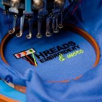Embroidery services and supply of embroidered apparel and accessories; low minimums, no set up charges and free shipping.