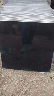 Processors & Exporters of Absolute Black Granite tiles sizes 600x600x18,20,30 & 40mm