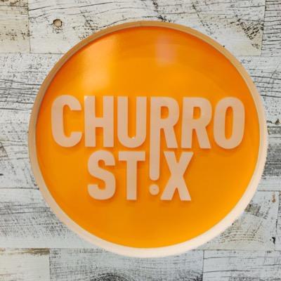 Freshly made churros served warm with dipping sauces.
