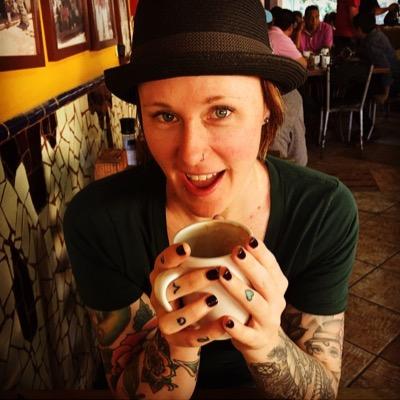 I am a singer, sometimes-rapper and lover of kitties and tattoos.