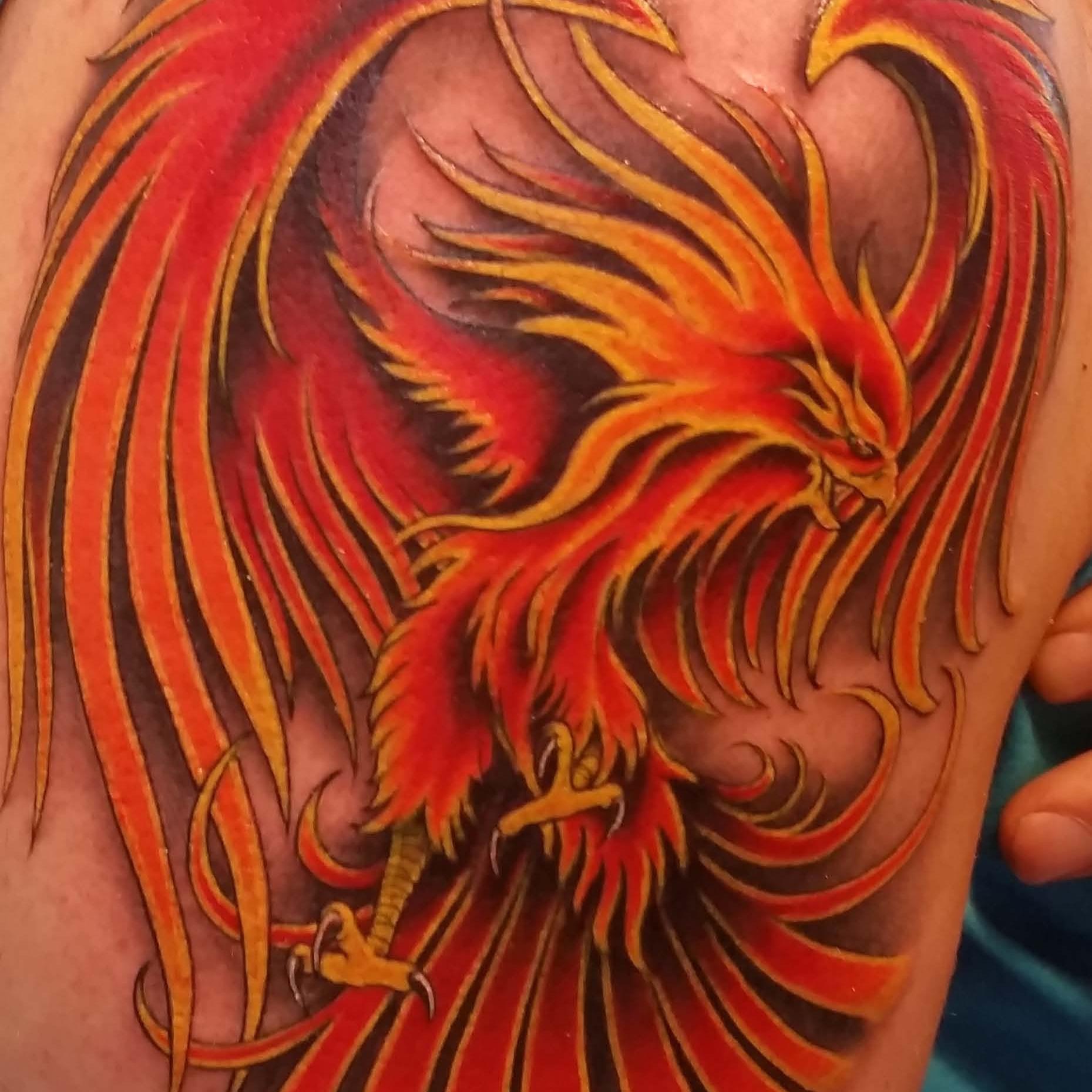 My life has been like the mythical Phoenix, why not have it on my arm!