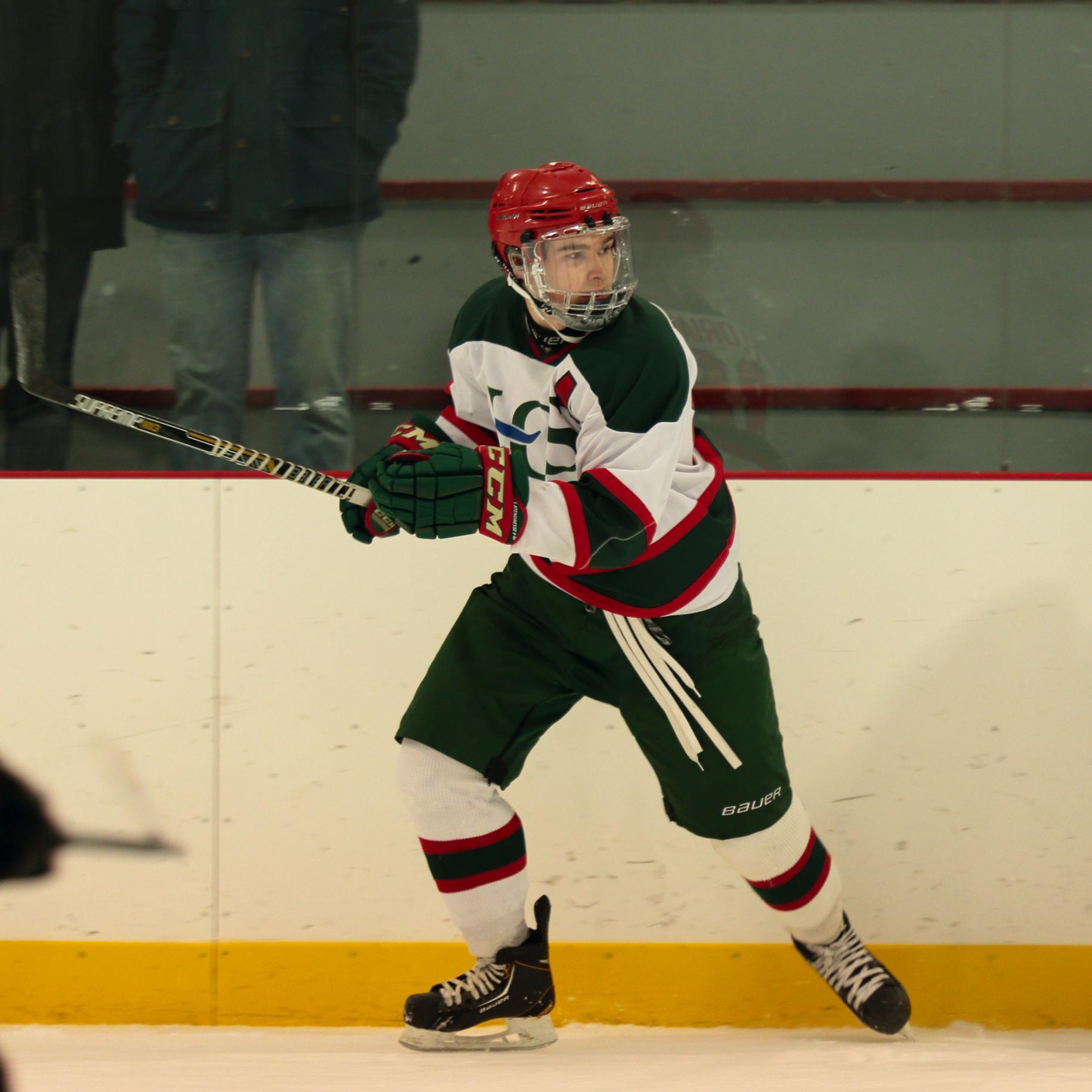 Proud Caper living the dream while playing puck