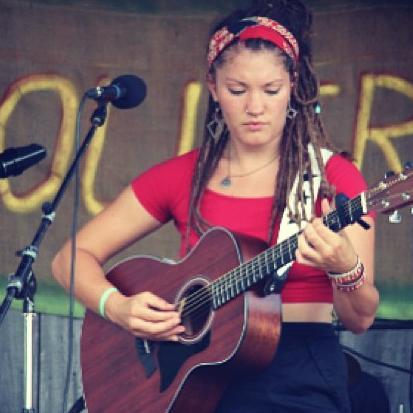 Soulful Folk musician, lady beast, bicycle wielding wanderer, acro yogi