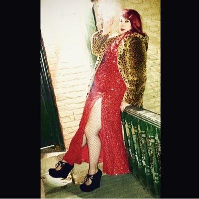 just a drag queen caught in a female body.