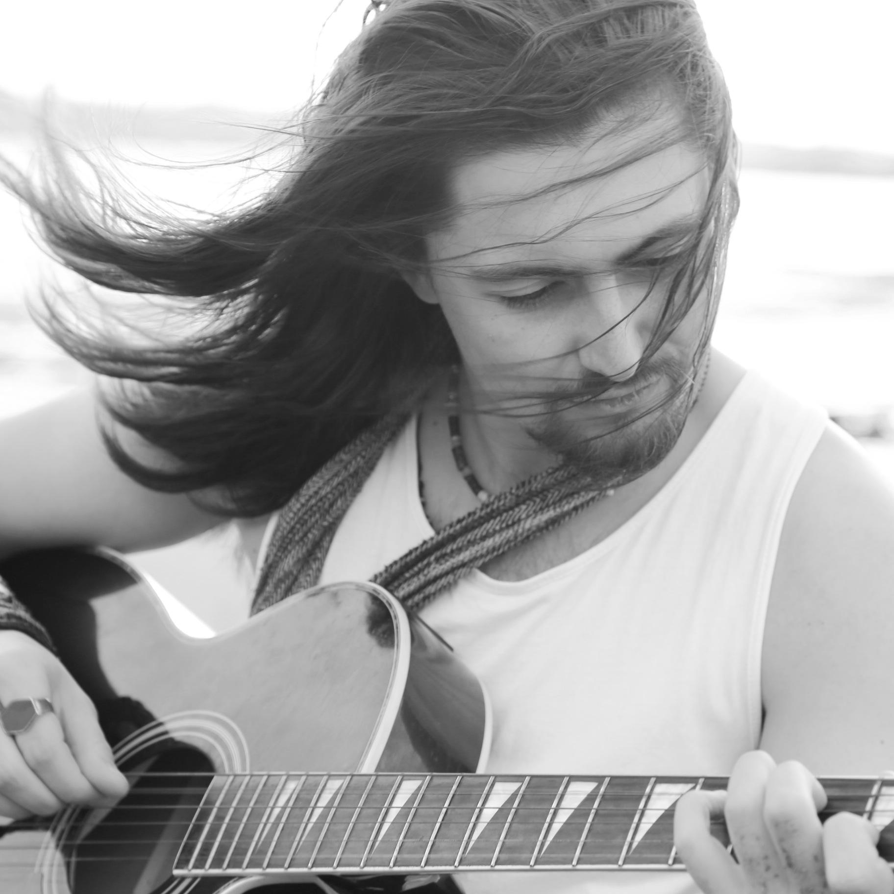 Acoustic Folk Singer/Songwriter. Lead Singer/Guitarist of Tom Clark and the Violet Narrative.