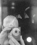 I'm just another mass of nerves, bone and muscle looking for love,
a thrill, a song ...