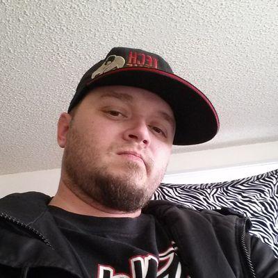 works with strange music street team promoting also writer and rapper Singer songwriter proud father of two crazy kids got to love them