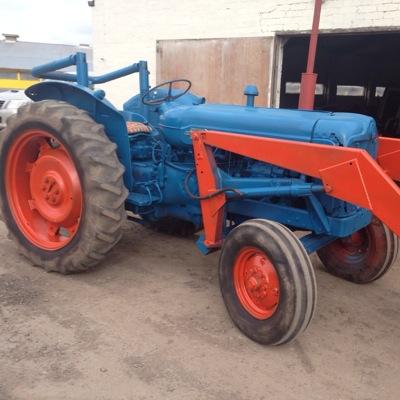 I'm a blue and orange tractor, born in 1952. I'm originally from Thirsk North Yorks, but have recently moved to Lincolnshire to live at Tattershall Farm Park