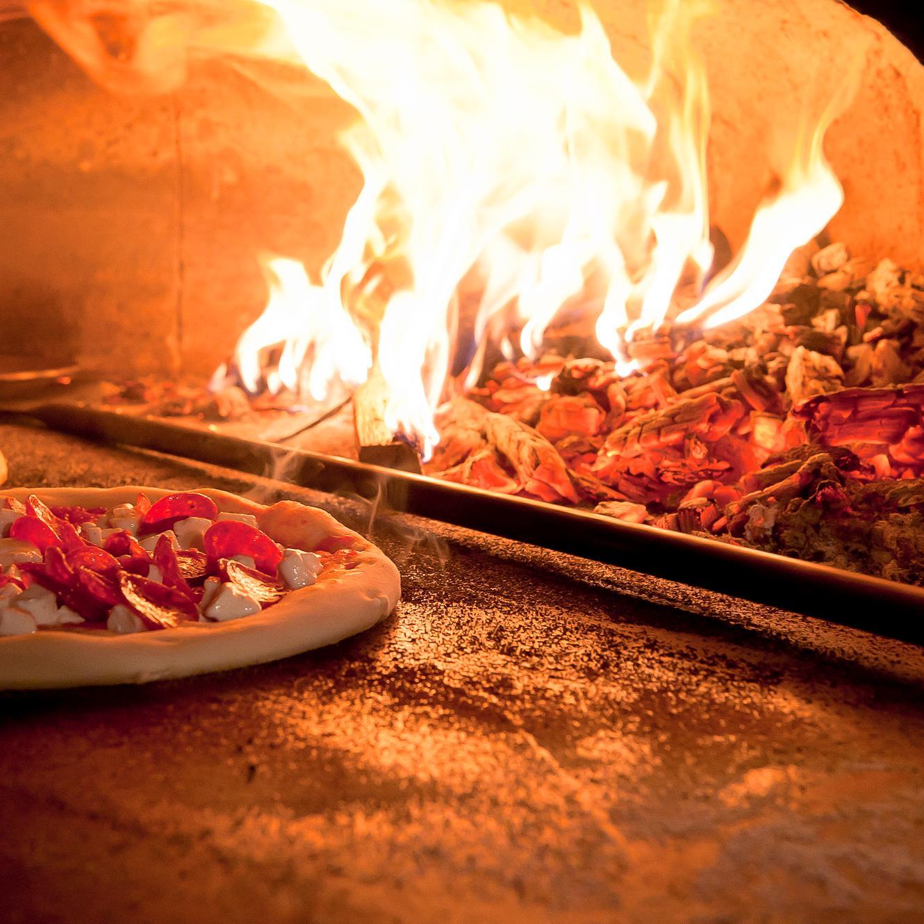 The food at RedRocks is inspired by the pizza from the best pizzerias of Naples. The menu features Neapolitan pizzas cooked in a classic wood fired oven.