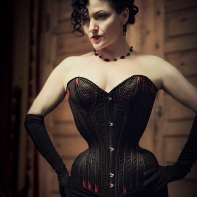 Proprietress of Dark Garden Corsetry, supporting uncommon beauty, one waist at a time.