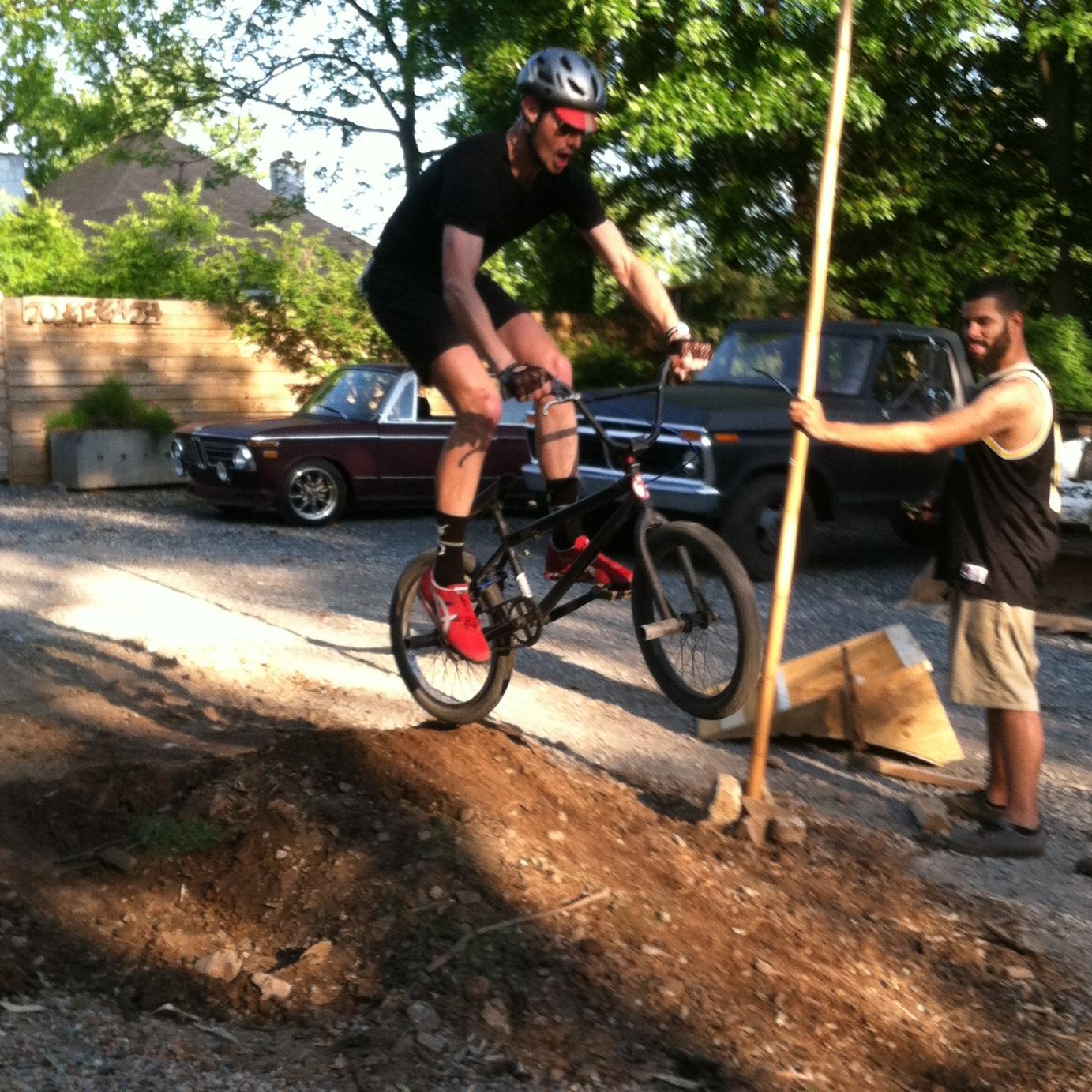 Boy, you ride that bike like the Devil through Hell.