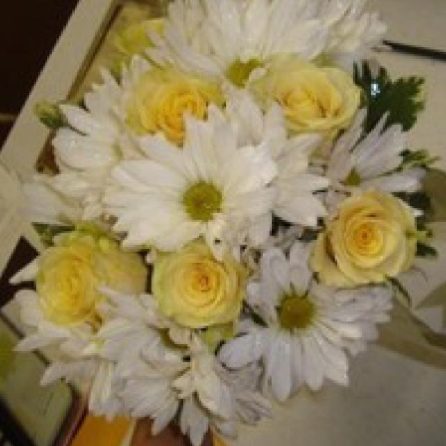I am a bouquet of roses and daisies. Johnny Cade gave me to Soda Curtis.