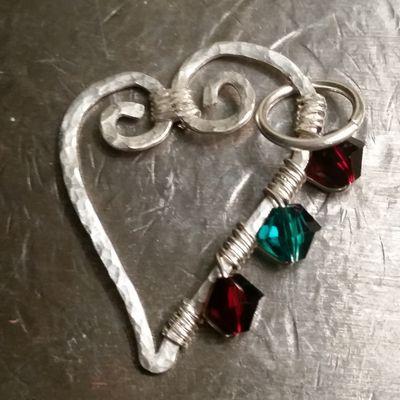 Northern Twisted Art is a small family operated shop specializing in Twisted wire gemstone trees, Gemstone SunCatchers, Family Trees and much much more!