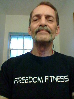 Widower, work at the Court House.  Two sons going to local university.  Life is OK.