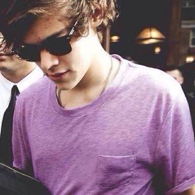 I study Harry's tattoos.