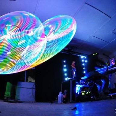 Massachusetts based performance duo 'Bujak' is @JeffBujak (on the keys) and @JenDulong (on the LED hula-hoop). Full Bio at http://t.co/vIm4BN4x8W