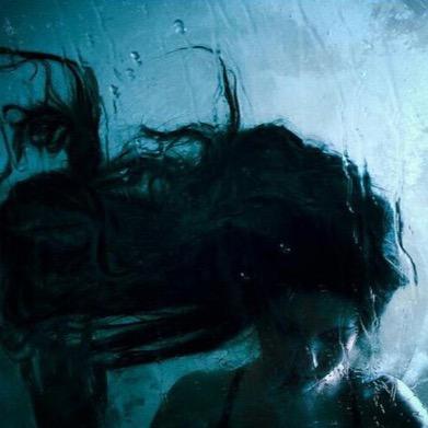 The broken glass disturbs the perfect image