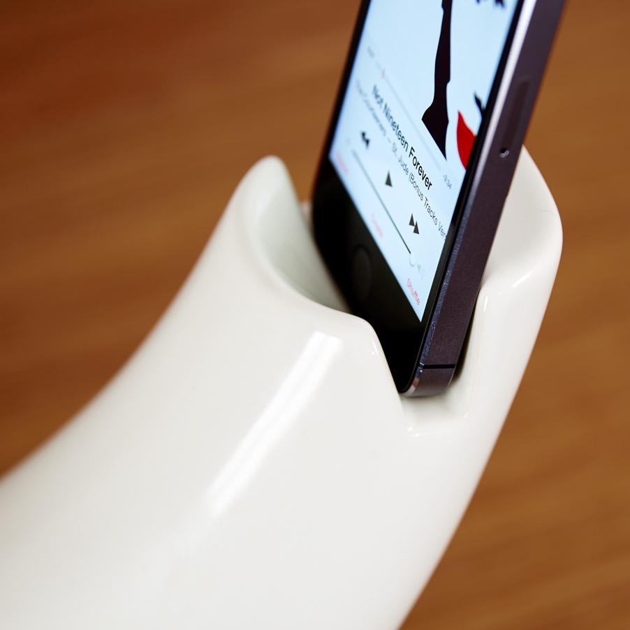 Low-tech meets High-tech: Introducing the revolutionary new way to boost your iPhone's built in speaker.