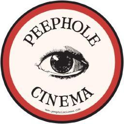 A miniature cinema collective. In each city, silent film shorts are screened 24/7 through a dime-sized peephole installed in a public location.