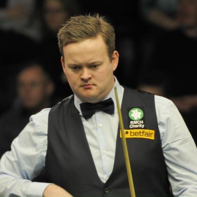 a professional snooker player who won the world championship in 2005 and born in Harlow in West essex in 1982.