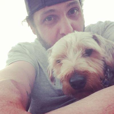 a boy and his dog. I make custom woodwork projects and proceeds go to my dog to have spinal surgery. also a cnc programmer :)