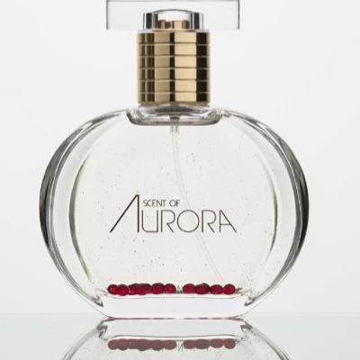 Parfymen Scent of Aurora from NorraNorrland,Sweden. A perfume created under the Nordic Light in northern Sweden containing gold and red glass pearls.