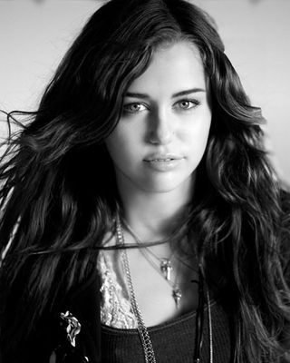I LOVE MILEY CYRUS WITH ALL MY HEART SHES MY FUCKING HERO IF YOU DONT LOVE HER DONT EVEN TALK TO ME CUZ I WILL BEAT YOUR ASS