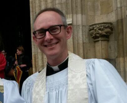 Associate Rector of Grantham, Associate Priest of St John's Spitalgate, father of three