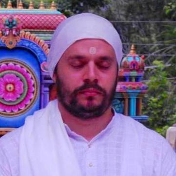 Teacher of Yoga and Advaita, Author and Columnist