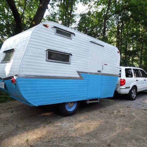 A 1959 canned ham camper awaiting restoration. Blog muse. Yard art. Sassy.