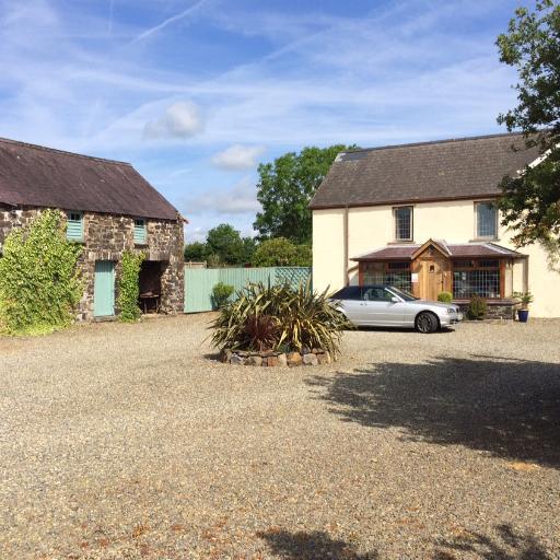 FOR SALE Pembrokeshire Smallholding with B&B income, 19th Century farm house with stone barns, wide tarmac drive to 5 acre paddock with level pasture. £495,000